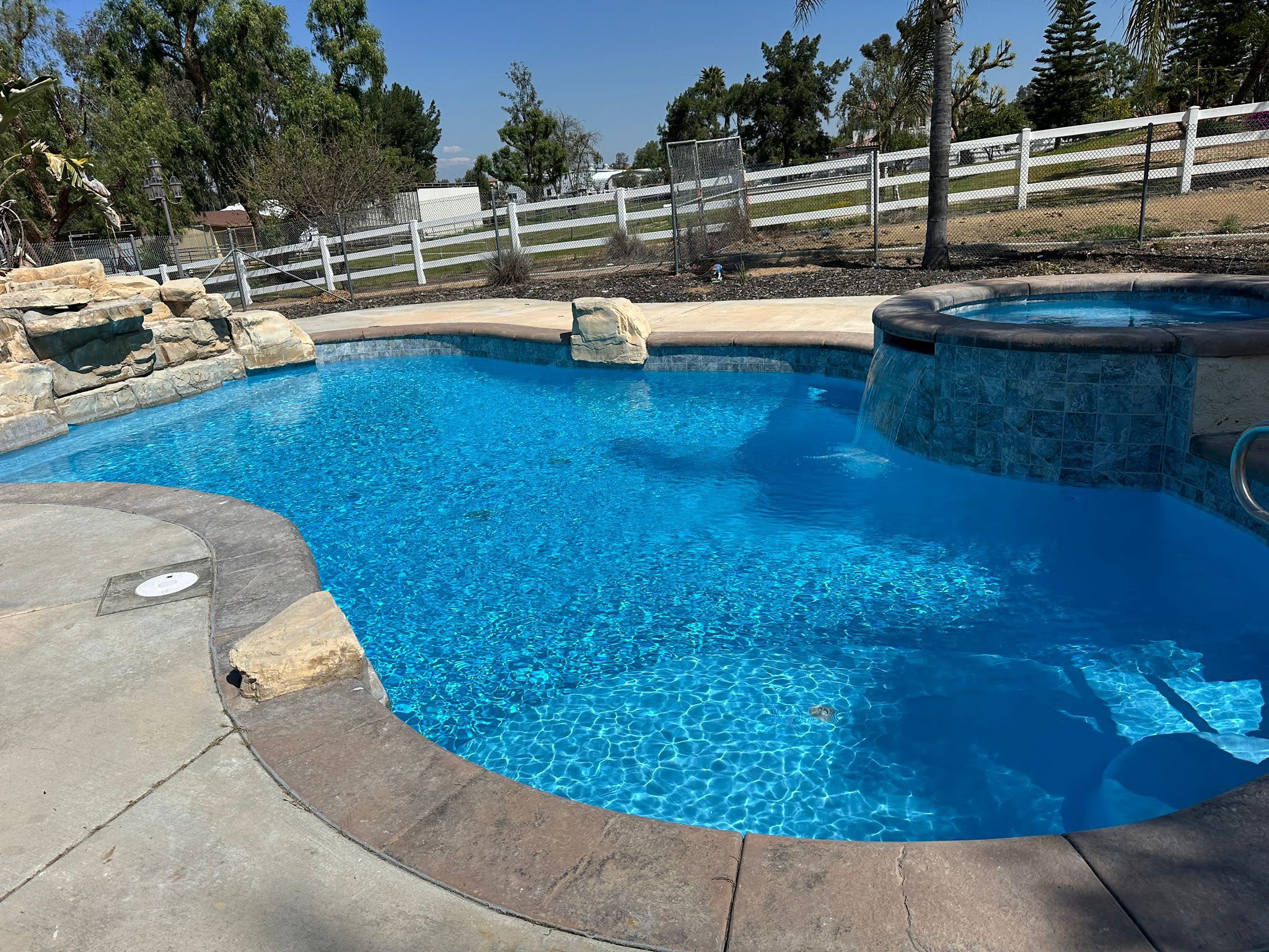 Restored Riverside pool with new blue plaster and tile